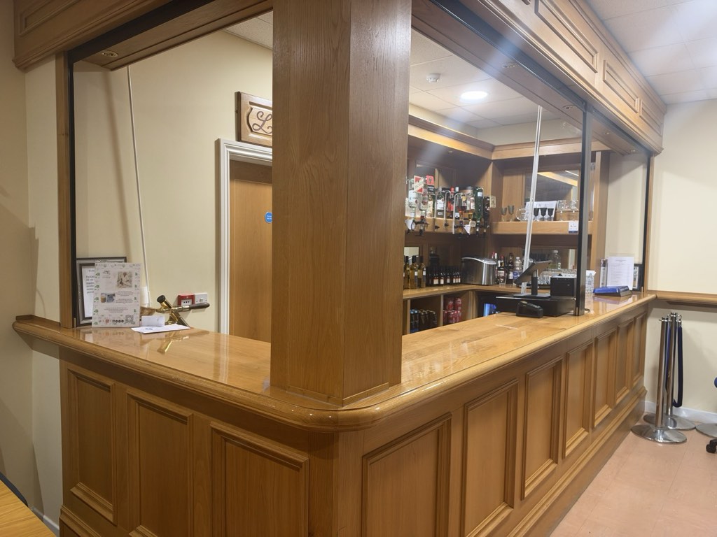 The oak-panelled bar