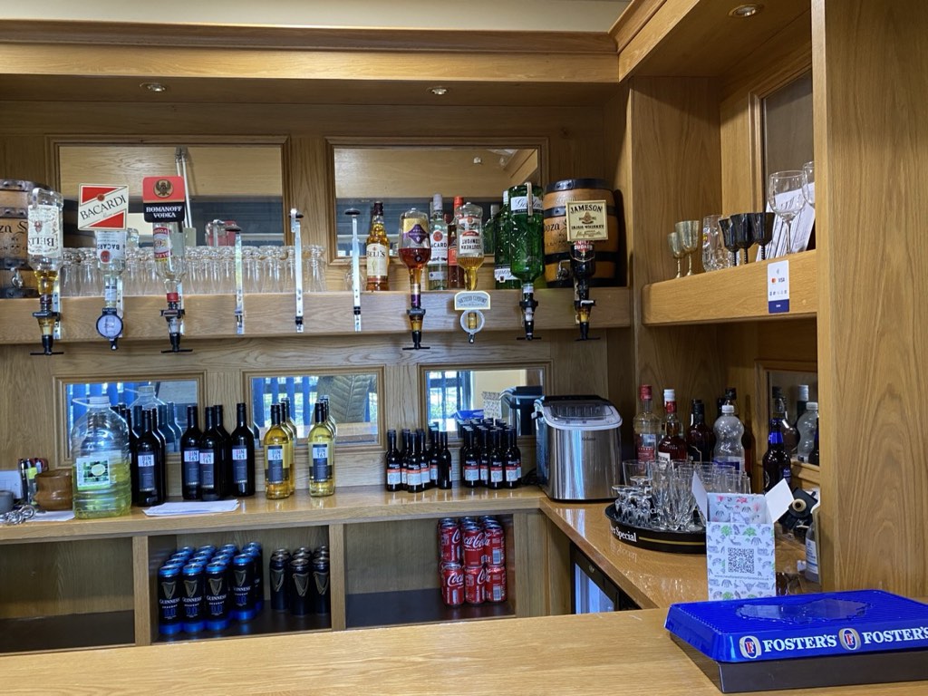 Optics, wines and glasses behind the bar